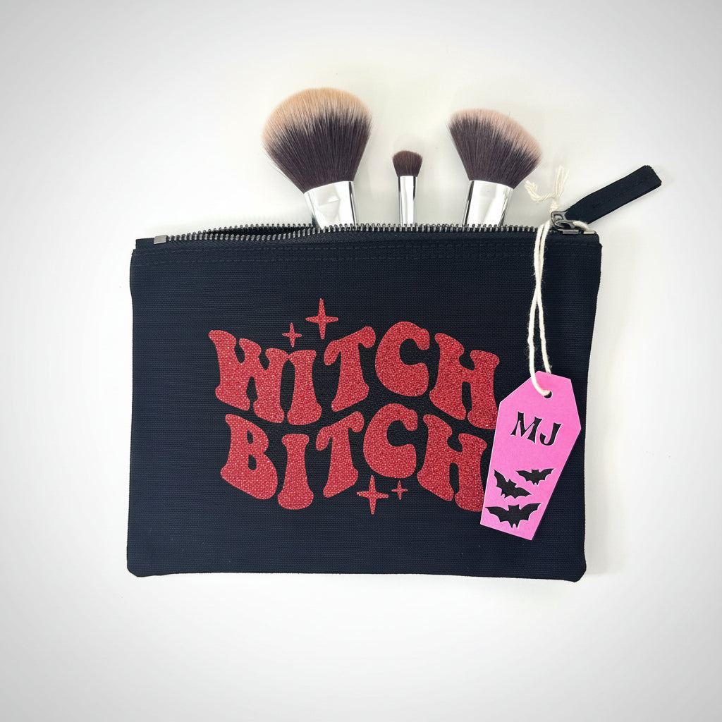 Witchy gothic makeup bag with red glitter witch bitch lettering on black canvas