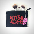 Witchy gothic makeup bag with red glitter witch bitch lettering on black canvas