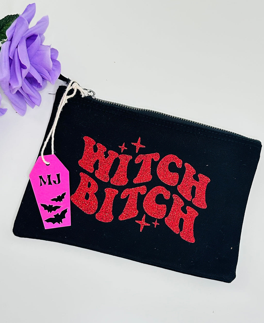 Witchy gothic makeup bag with red glitter witch bitch lettering on black canvas