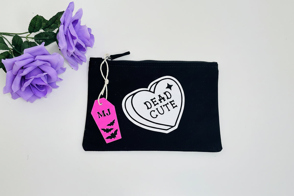 Dead Cute gothic makeup bag with white glitter print