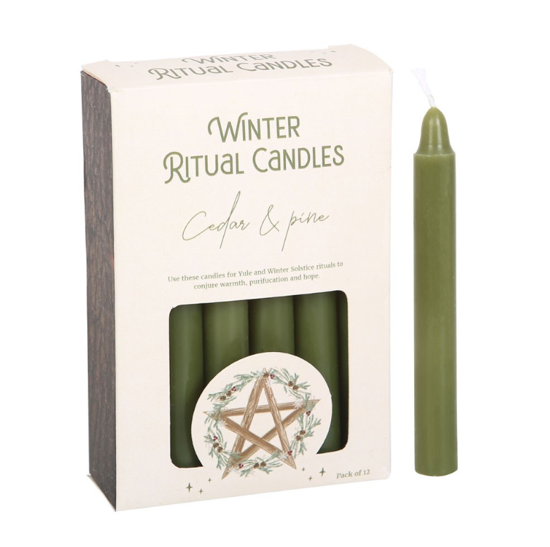 Cedar and pine winter ritual spell candles with pentagram motif