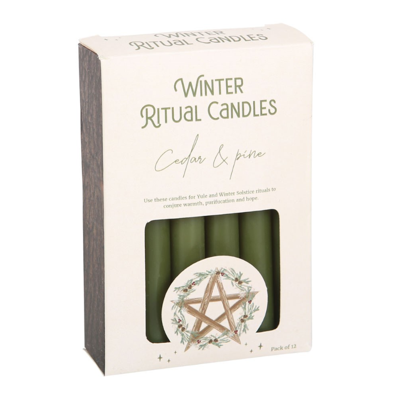 Cedar and pine winter ritual spell candles with pentagram motif