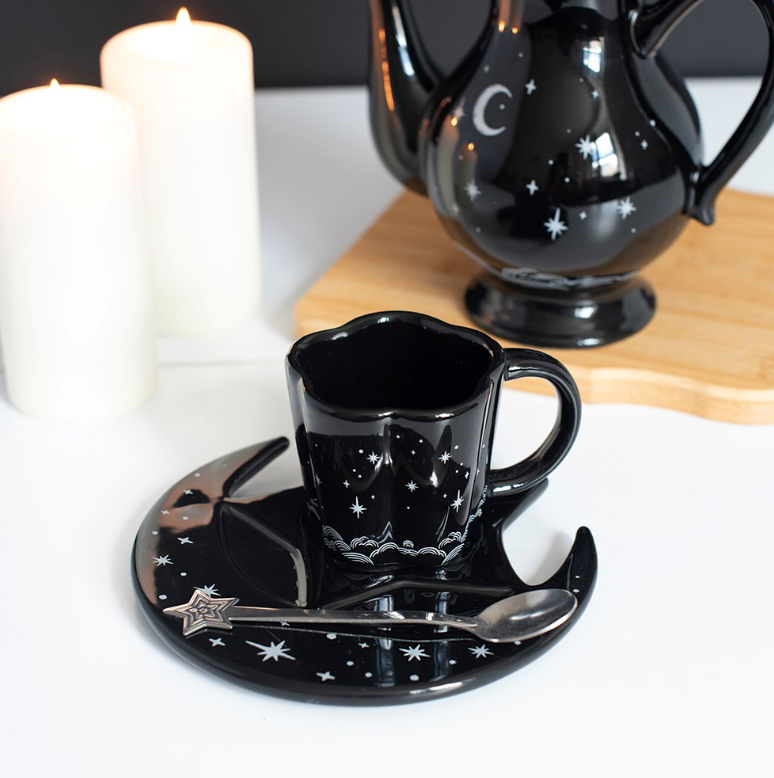 Black espresso cup with moon-shaped saucer and star-topped spoon, gothic celestial coffee set