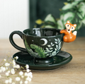 Green ceramic teacup and saucer with forest foliage design and 3D fox detail, woodland tea gift