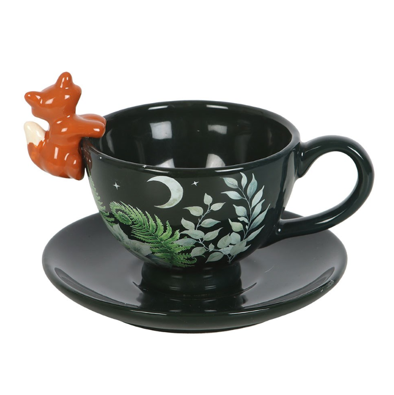 Green ceramic teacup and saucer with forest foliage design and 3D fox detail, woodland tea gift