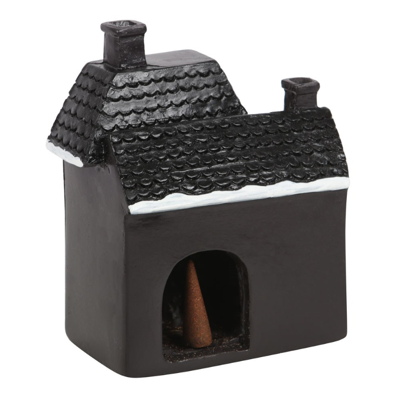 Black haunted house incense cone burner with ghost and cobweb details and smoke rising from two chimneys, gothic Christmas decor