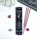 Spellbound Secrets black ceramic incense ash catcher showing two narrow parallel channels for ash collection and single incense stick hole at top