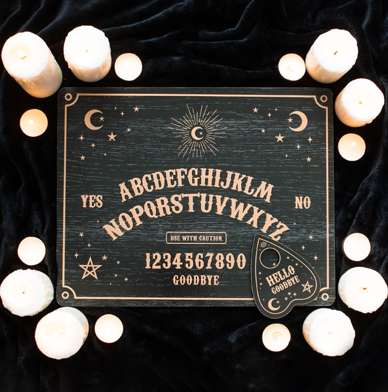 Black wooden talking board with gold celestial engravings and planchette, by MJ Gothic Gifts
