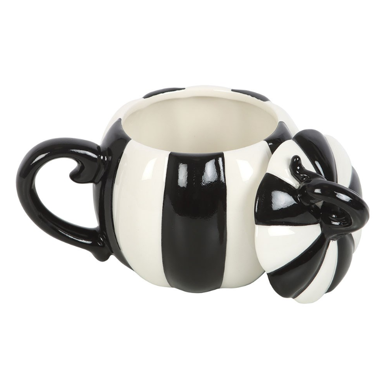 Black-and-white striped pumpkin mug with a matching lid.