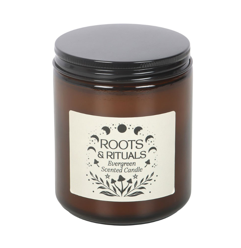 Roots and Rituals Evergreen scented candle in amber glass jar with black metal screw lid