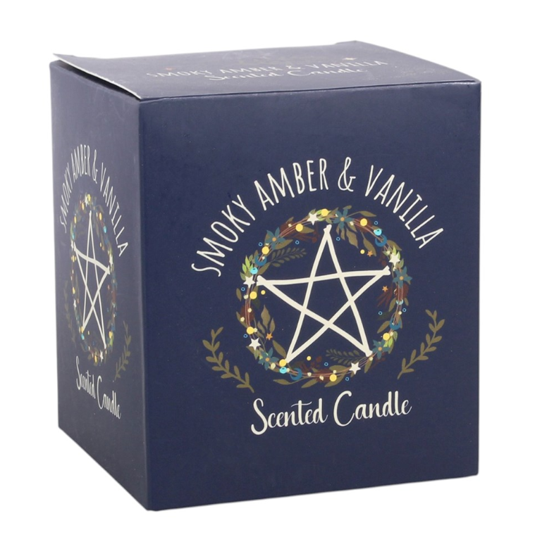 Smoky Amber and Vanilla Solstice Wreath scented candle in glossy navy glass jar with matching navy gift box showing pentagram wreath design