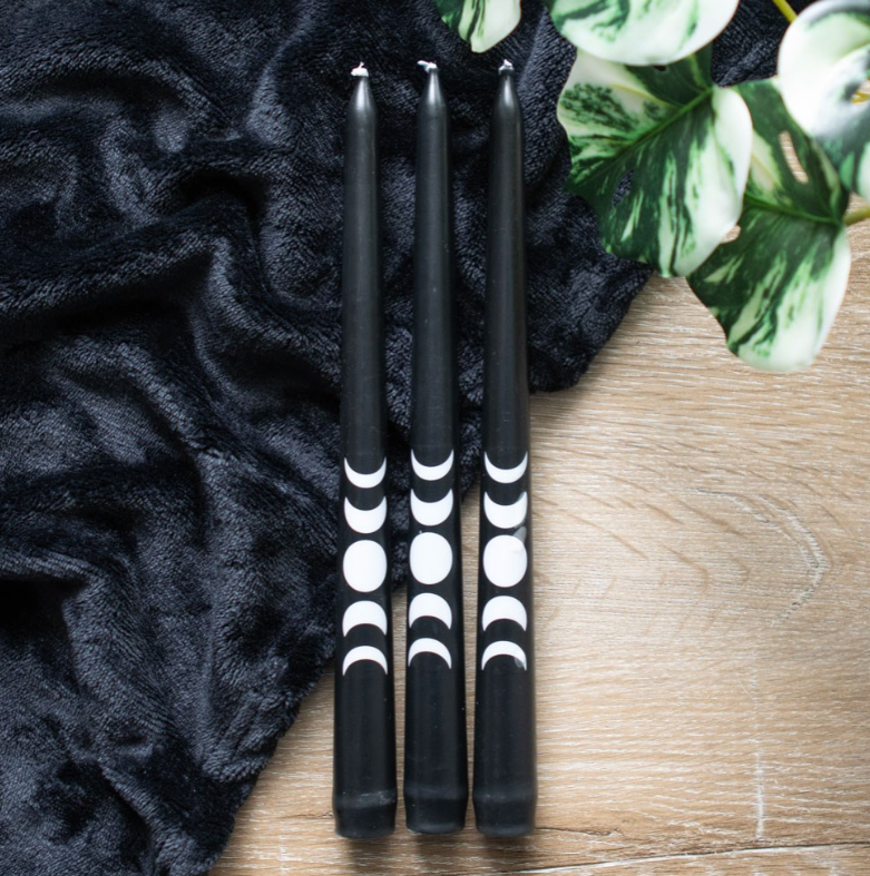 Set of 3 black taper candles with a mystical moon phase design