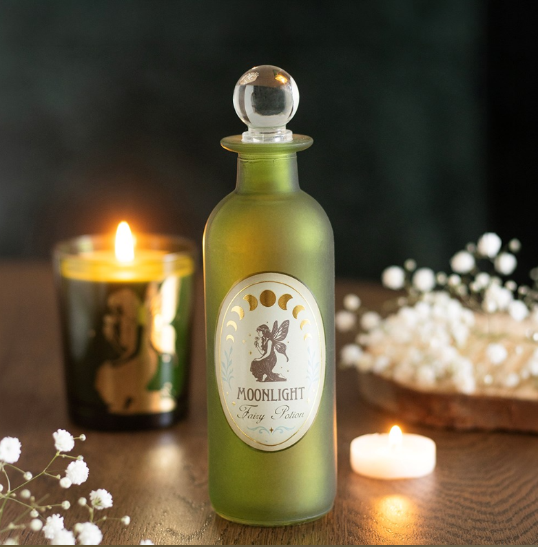 Green glass fairy potion bottle with crystal-style stopper 