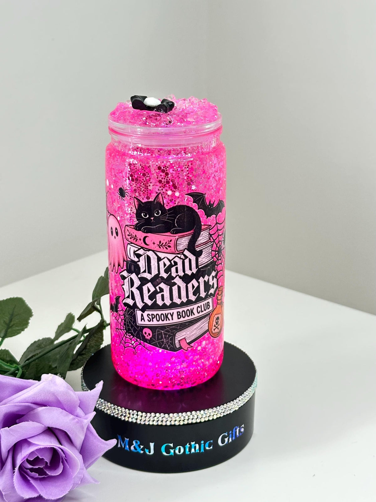 Gothic book lover snow globe tumbler with spooky cat and pink glitter