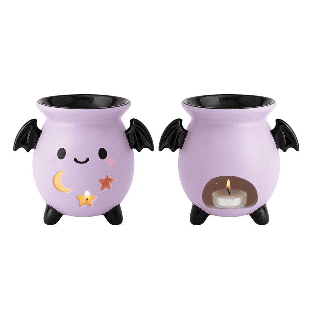 Pastel bat cauldron oil burner with bat wings and moon star cut-out details