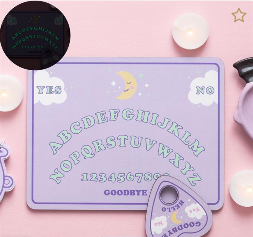 Pastel glow in the dark talking board with planchette and celestial details