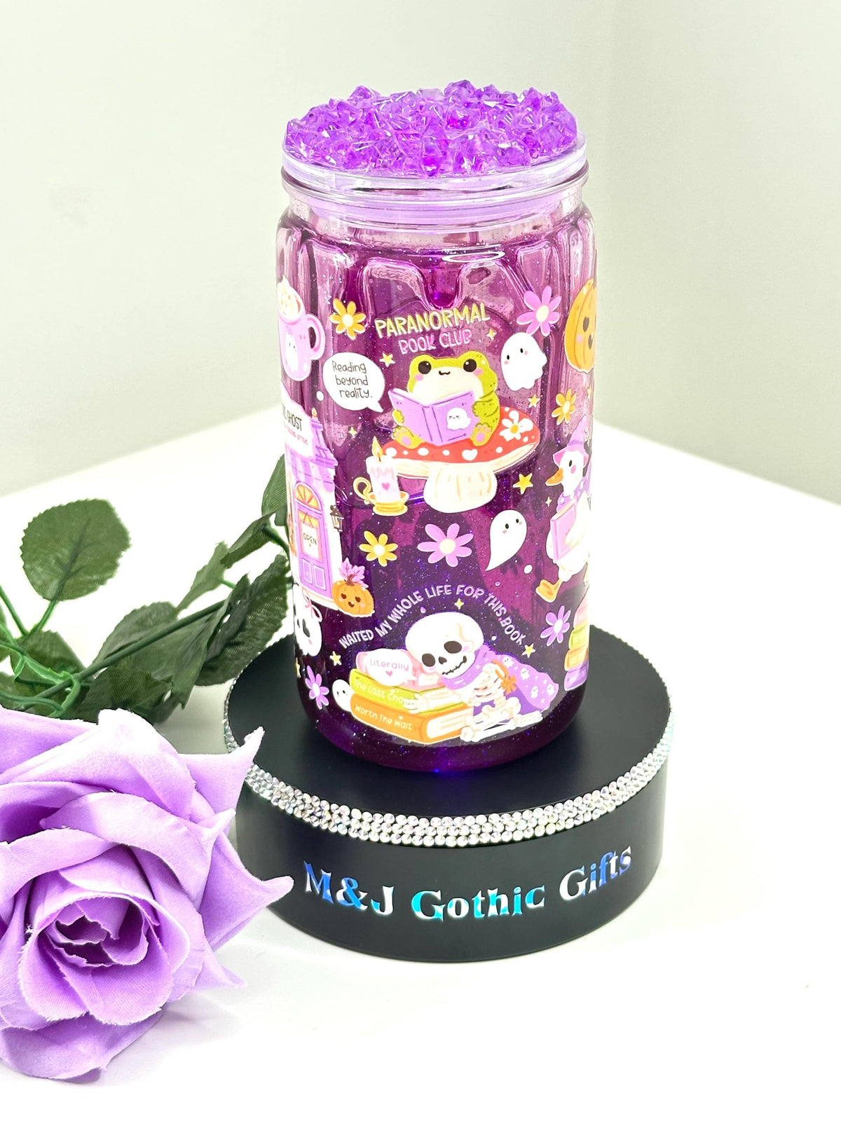Pastel gothic Halloween snow globe tumbler with iced lid and straw