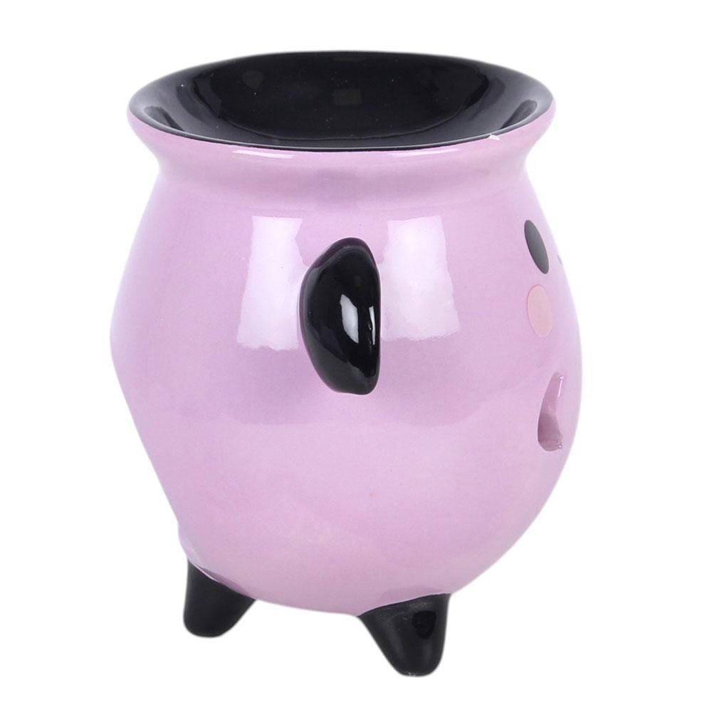 Pastel bat cauldron oil burner with bat wings and moon star cut-out details