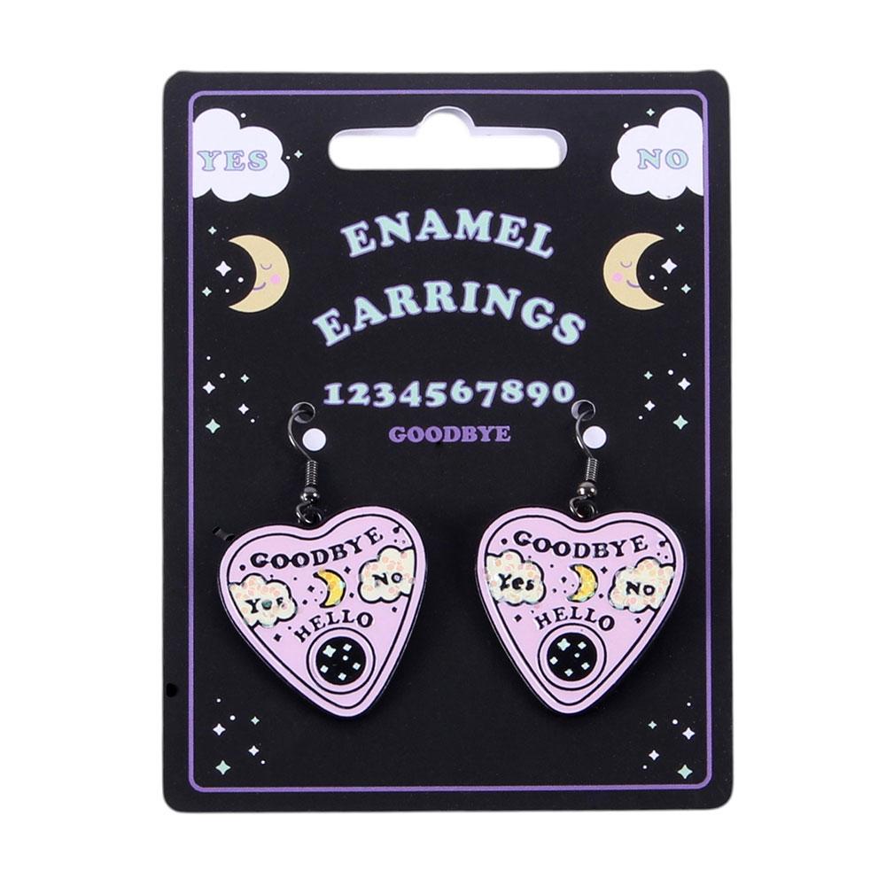 Pastel talking board planchette earrings with celestial details spooky cute jeweller