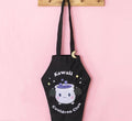 Kawaii cauldron club coffin shaped tote bag with crescent moon enamel pin badge