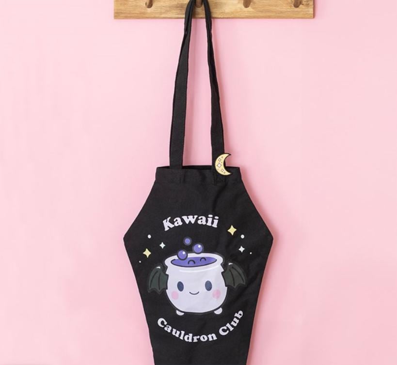 Kawaii cauldron club coffin shaped tote bag with crescent moon enamel pin badge