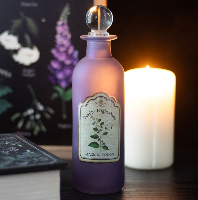 Decorative glass potion bottle with intricate Deadly Nightshade design